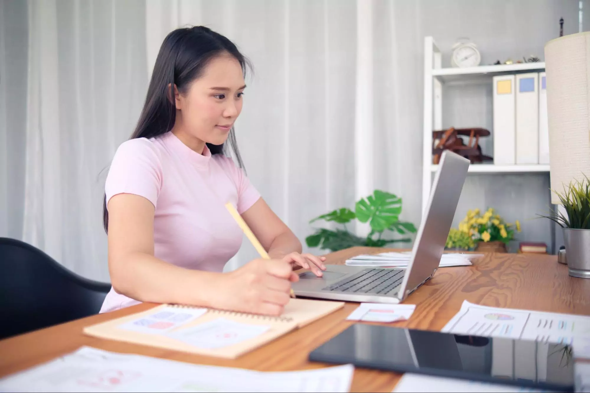  Interface Designer working on a laptop
