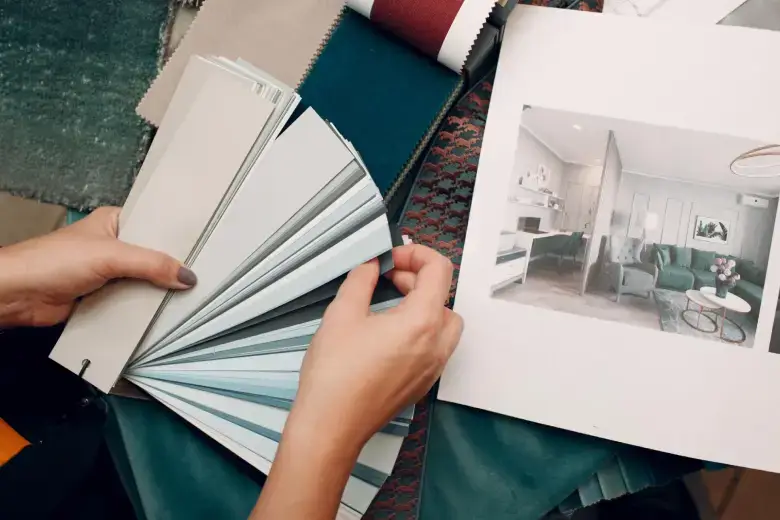 Interior decorator selecting materials and fabrics Interior decorator selecting materials and fabrics