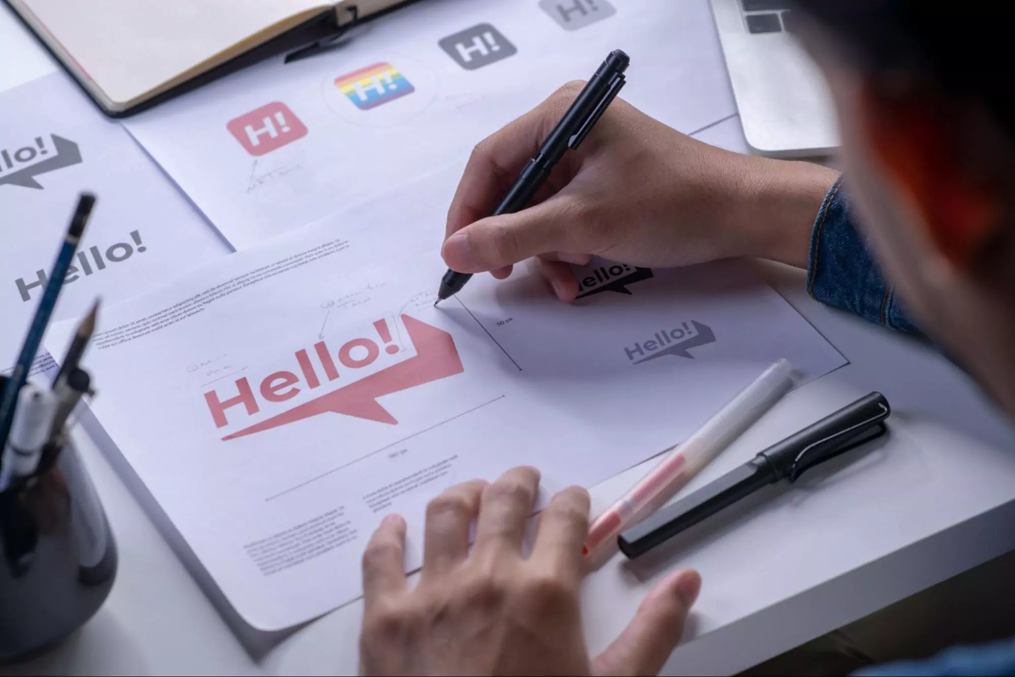 Graphic designer working on the type-face for a logo