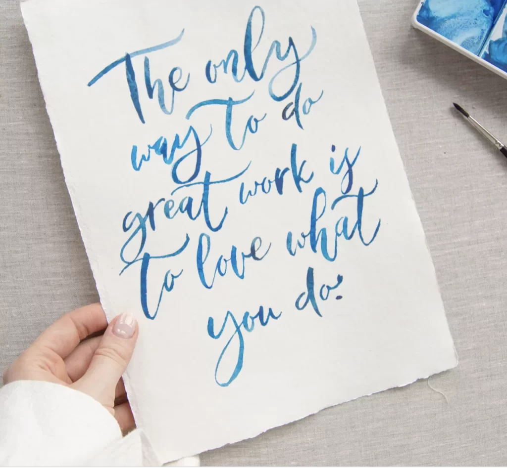 Use of typography in a handwritten script written using blue watercolour Use of typography in a handwritten script written using blue watercolour