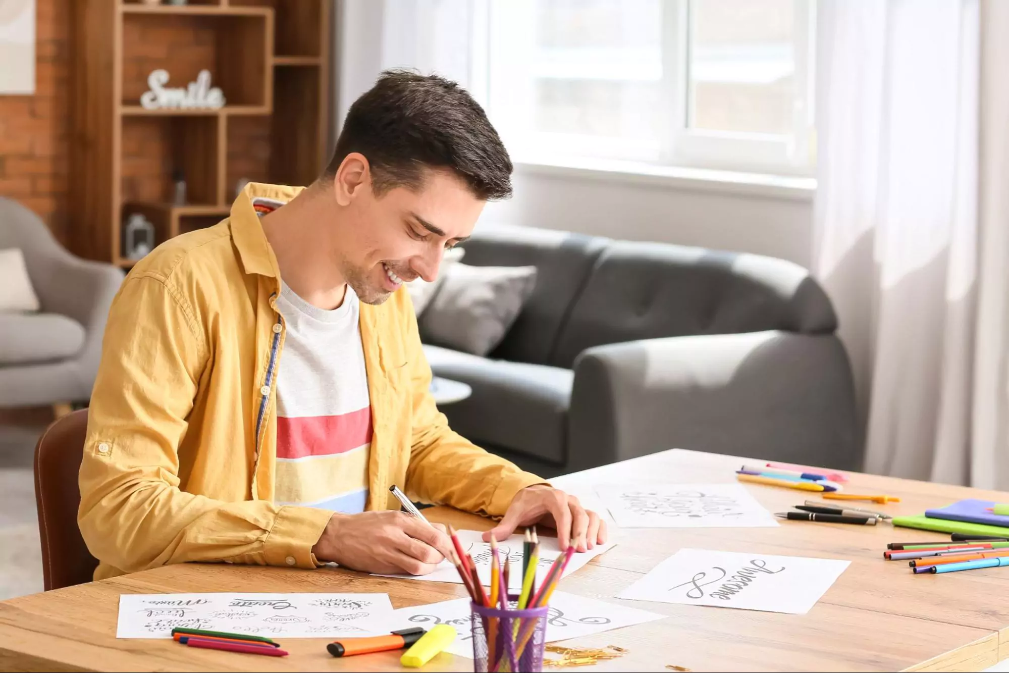 Logo designer creating sample typography sketches for a project
