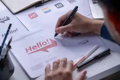 Graphic designer working on the type-face for a logo