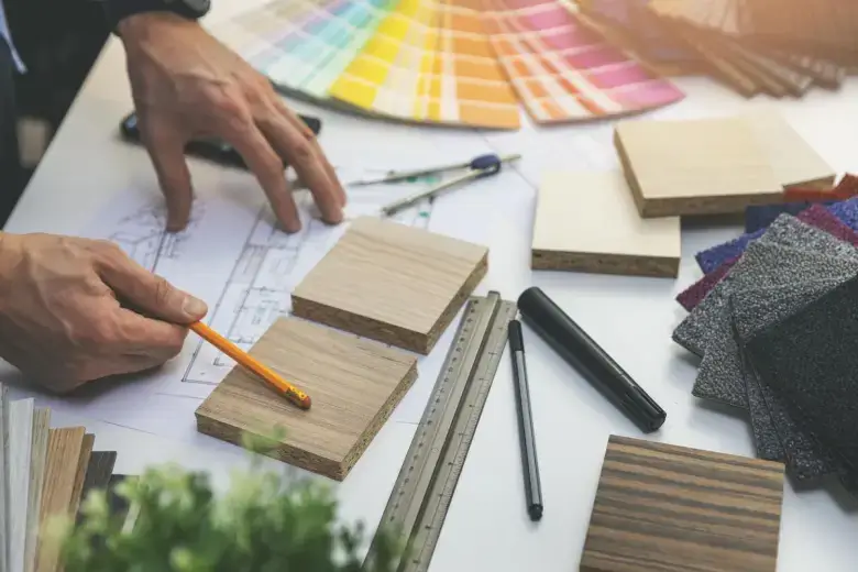  Interior decorator examining wood samples