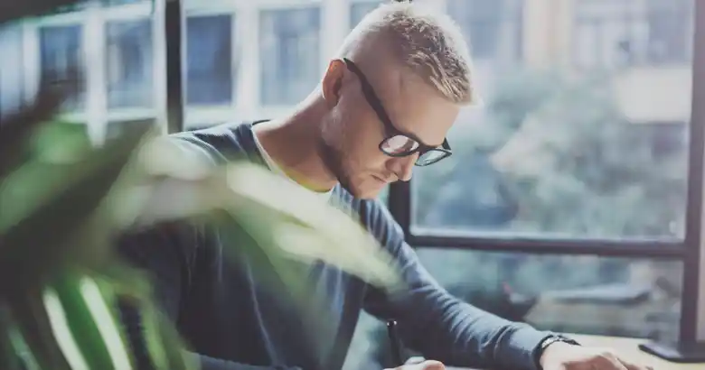 Graphic designer creating a sketch
