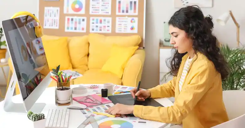Graphic designer creating a logo on the computer