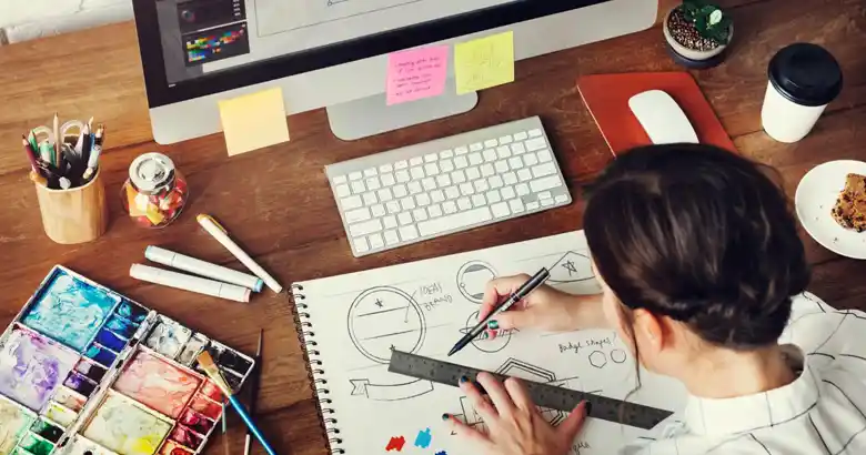 Young graphic designer designing a logo for a brand