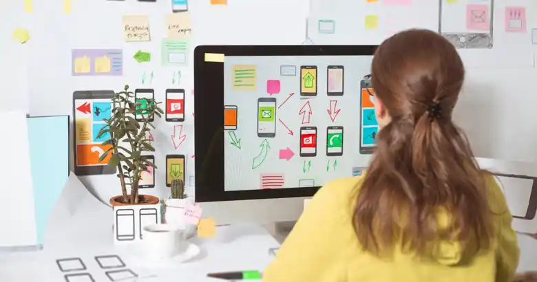 UX designer ideating a mobile application's interface.