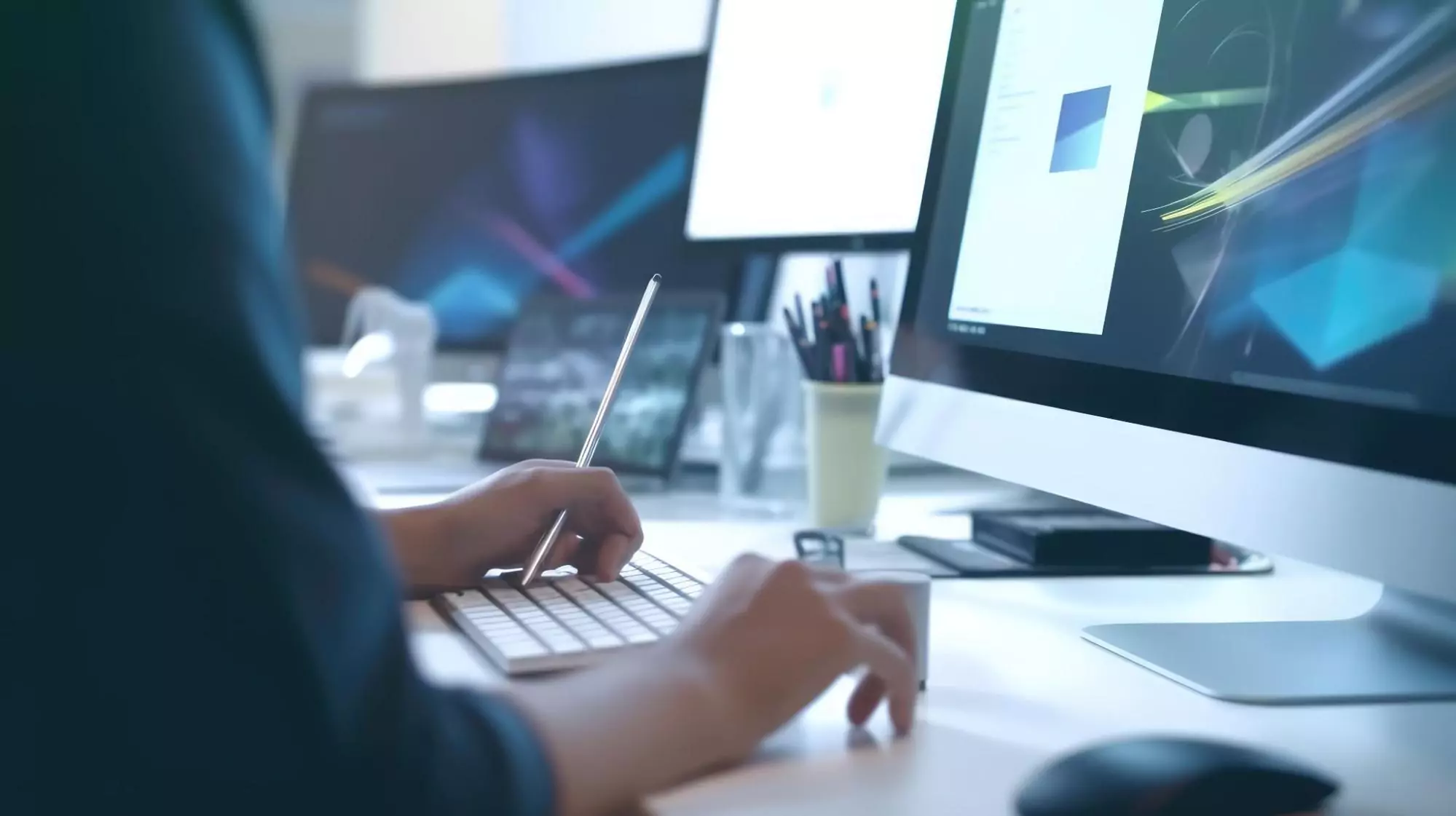 Graphic illustrator working on a laptop