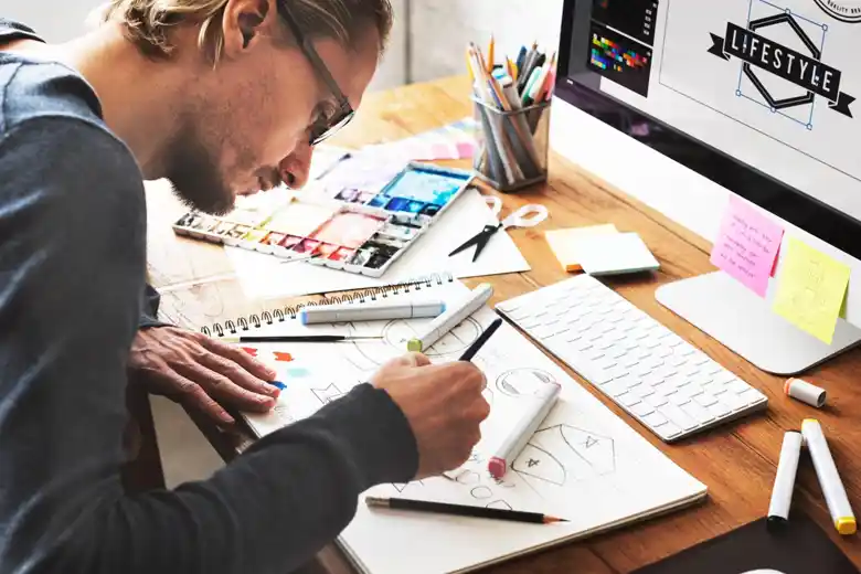 Professional logo designer creating mock-ups Professional logo designer creating mock-ups