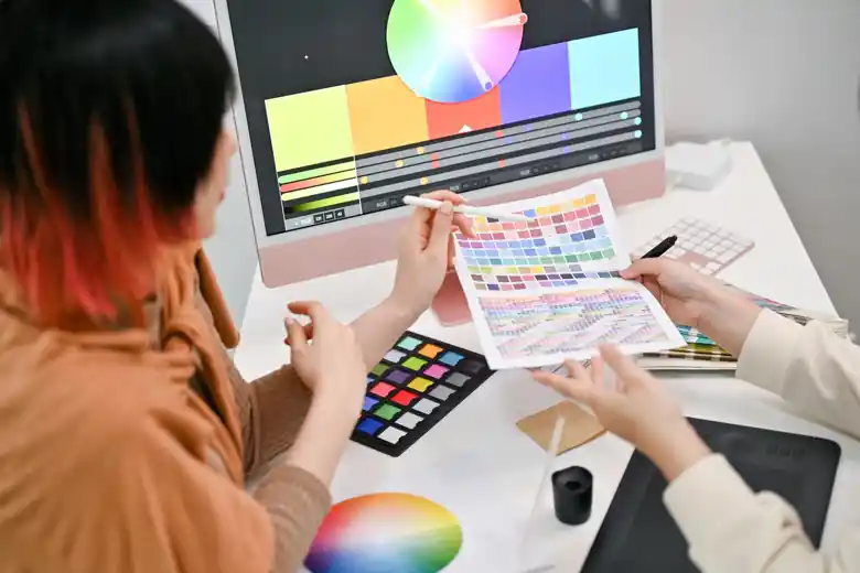 Visual designers selecting the colour palette
Visual designers selecting the colour palette