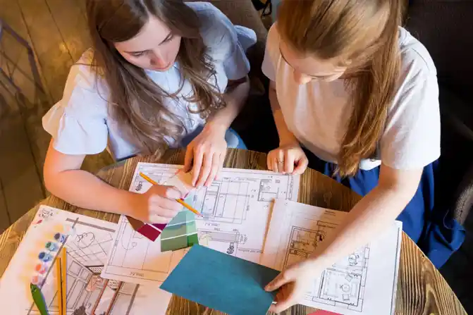 Interior decorators planning the layout Interior decorators planning the layout