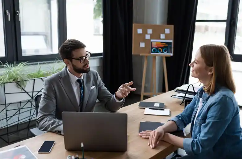 Designers having a discussion during a UX UI interview 
