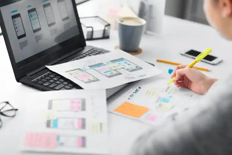UI designer finalising the structure of a mobile application