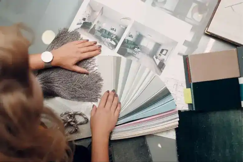 Colour consultant working on colour palette selection for a living room design