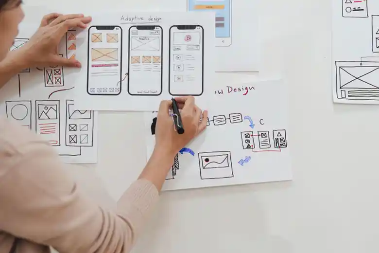 UX designer creating a sketch for an adaptive interface UX designer creating a sketch for an adaptive interface