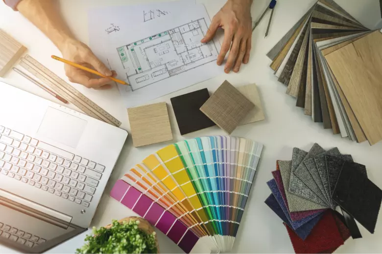 Designer finalising the colour scheme and materials for an interior design project Designer finalising the colour scheme and materials for an interior design project