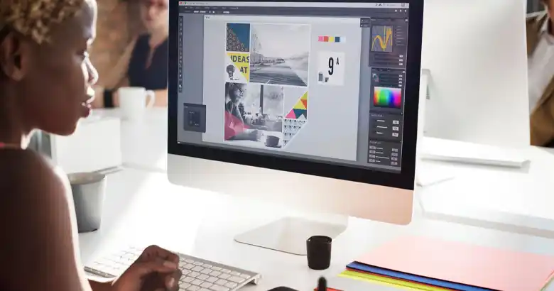 Graphic designer creating a poster
