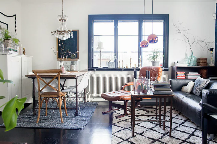 Use of rugs for creating different zones in a room.
