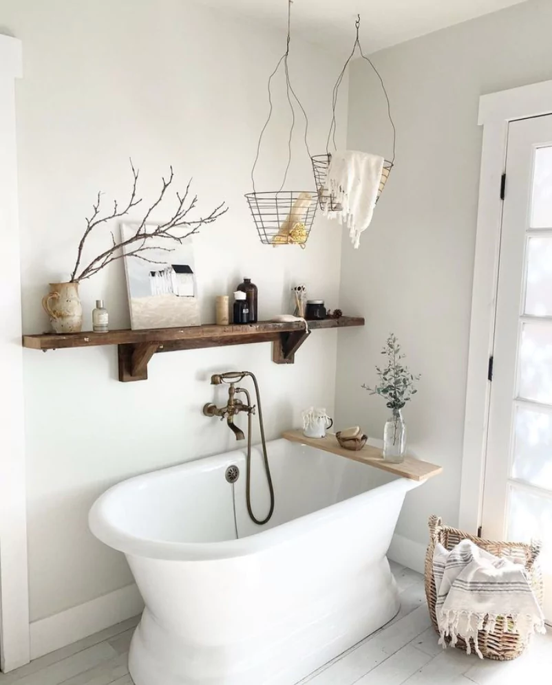 A wooden shelf in the bathroom to expand storage and uplift the overall feel.