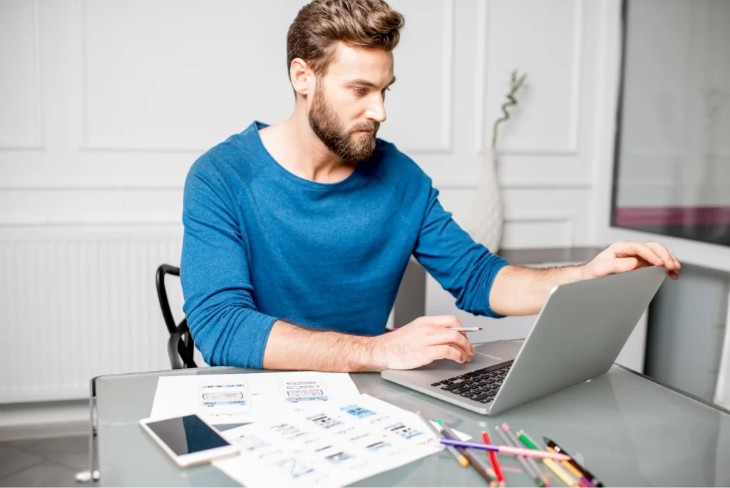 UI designer working on a mobile application design
UI designer working on a mobile application design