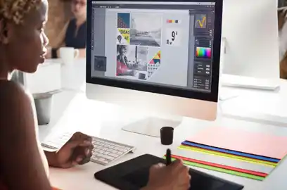 Graphic designer creating a poster