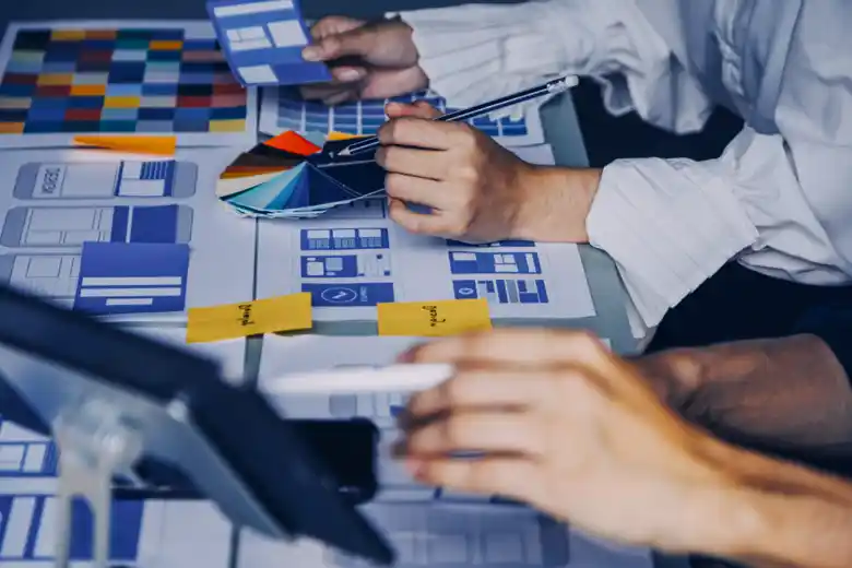 UX Designers selecting the colour palette for a mobile application