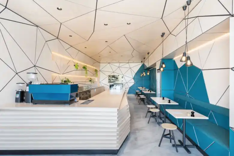 A cafe interior design emphasising the use of geometric shapes A cafe interior design emphasising the use of geometric shapes