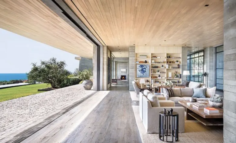 A home interior design that seamlessly blends the exterior and interior spaces A home interior design that seamlessly blends the exterior and interior spaces