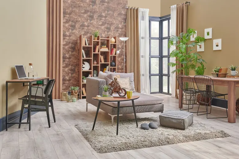 Living space designed in warm neutral colour scheme and accessorised with furnishings