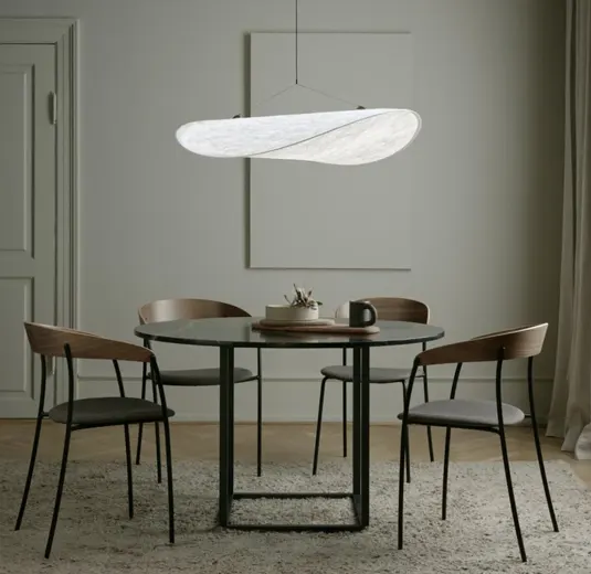 A dining area designed with statement lighting
A dining area designed with statement lighting