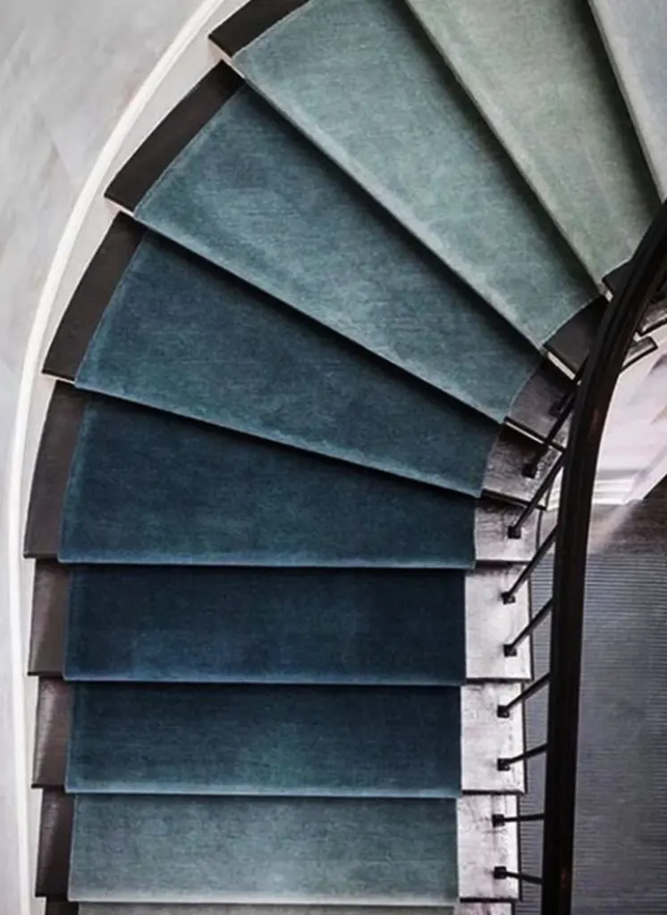 A staircase designed with a graduating colour scheme A staircase designed with a graduating colour scheme
