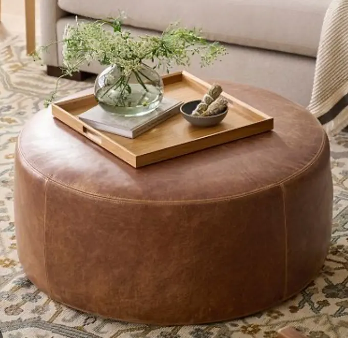 Ottoman - an upholstered padded seat or footstool Ottoman - an upholstered padded seat or footstool