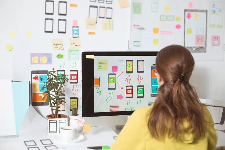 Designer creating UX flowcharts and diagrams Designer creating UX flowcharts and diagrams