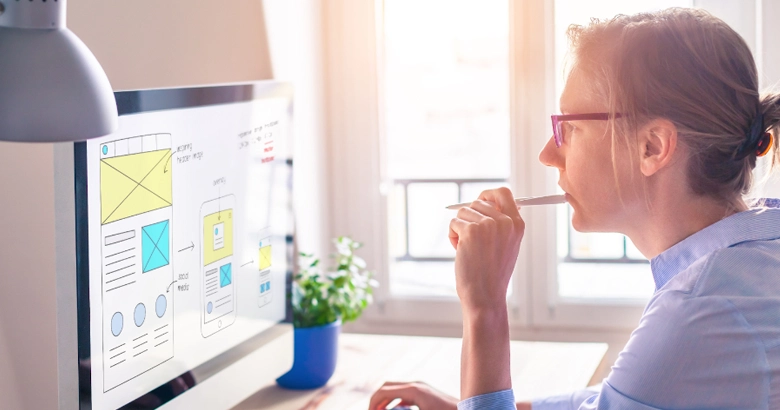 UX designer making low-fidelity wireframes for a mobile application