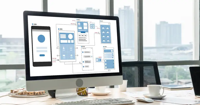 UI design wireframes on monitor. UI design wireframes on monitor.