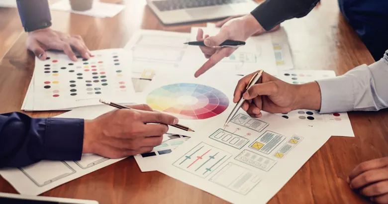UX designers working on the colour palette of an application's interface