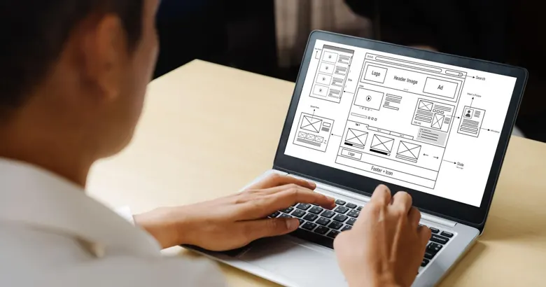 UX designer creating a low-fidelity wireframe for a website