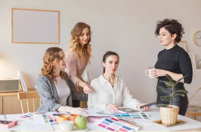 A team of graphic designers finalising the colour palette.