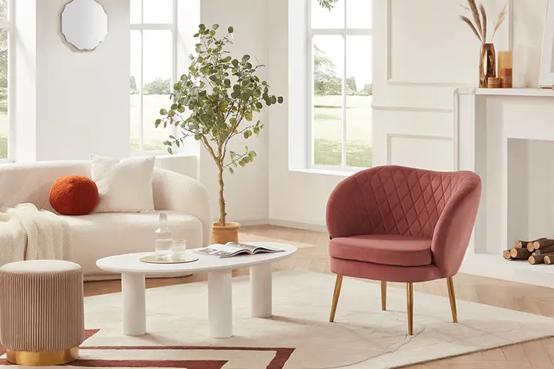 Contrasting coloured accent chair with coffee table as a statement piece in a living room Contrasting coloured accent chair with coffee table as a statement piece in a living room