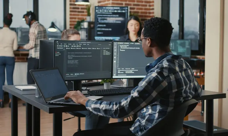 A UI developer working on te backend code of the website
