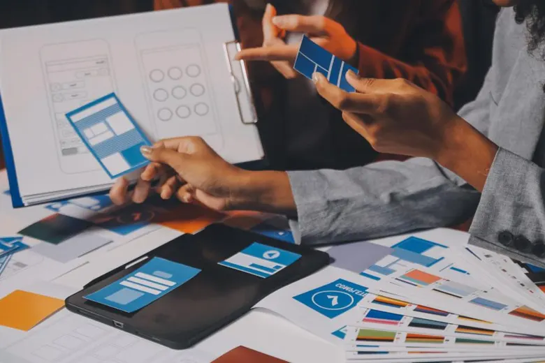 UX designer using research data to create layout for an application
