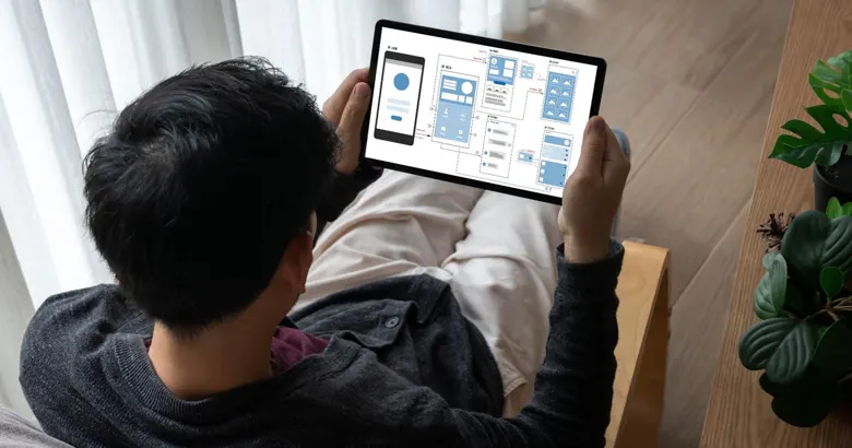 UI developer working on a mobile application interface.
