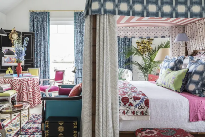 Small bedroom with mixed patterns including florals and geometric prints.
Small bedroom with mixed patterns including florals and geometric prints.