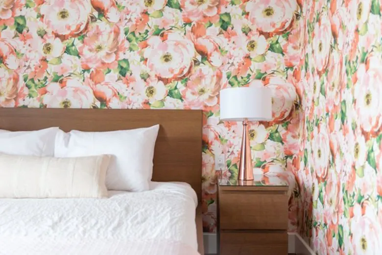 Small bedroom featuring bold, colourful wallpaper as a focal point.
Small bedroom featuring bold, colourful wallpaper as a focal point.