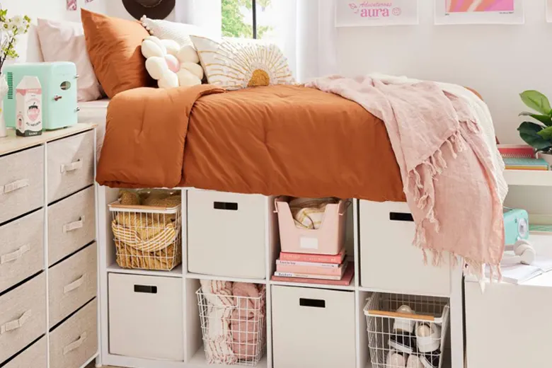 Small bedroom with under-bed storage for organizing seasonal clothing.
Small bedroom with under-bed storage for organizing seasonal clothing.