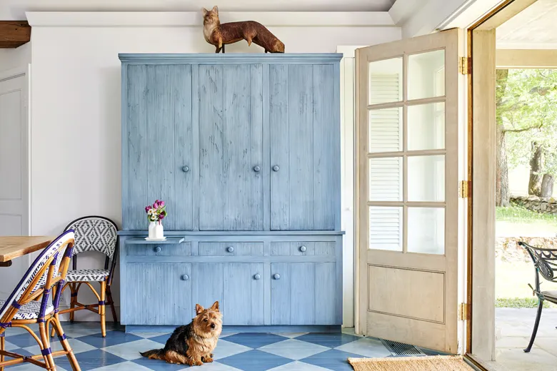 Room with vibrantly painted floors and neutral walls.
Room with vibrantly painted floors and neutral walls.