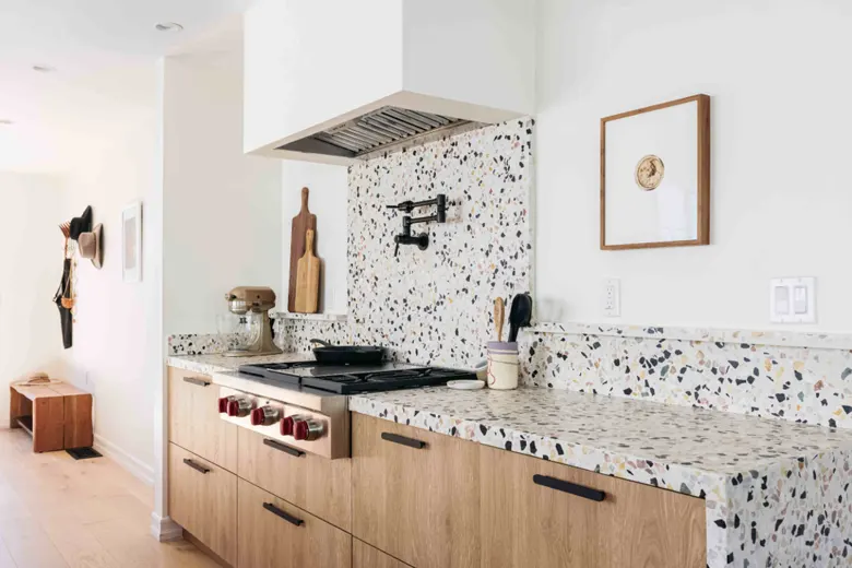 Kitchen with vibrant terrazzo countertops. Kitchen with vibrant terrazzo countertops.