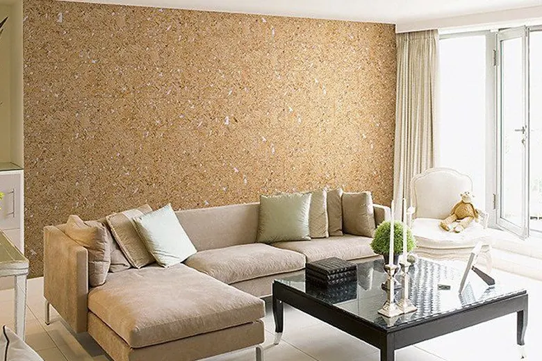 Living room with cork-clad walls and modern furniture. Living room with cork-clad walls and modern furniture.