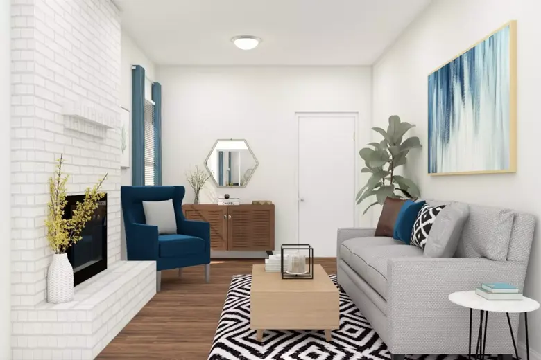 Room with a large sofa, small accent chairs, and an oversized painting. Room with a large sofa, small accent chairs, and an oversized painting.