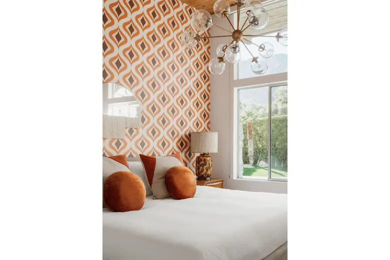 A bedroom interior with accent walls and simple decor. A bedroom interior with accent walls and simple decor.